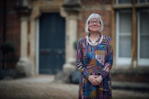 Deborah mason stood in front of one of Kellogg's buildings