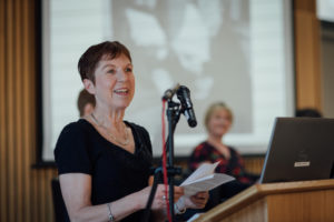 Susan Michie speaking at the lectern