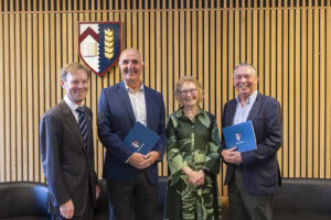 Jonathan Michie and Ruth Sawtell with Nigel Mason Award winners