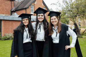 Kellogg students smiling at camera