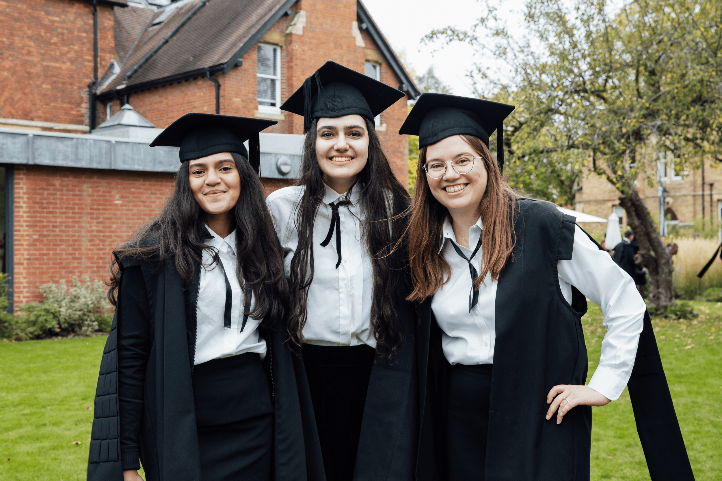 Kellogg students smiling at camera