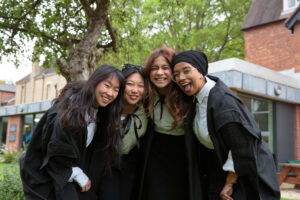 Group of female student smiling.