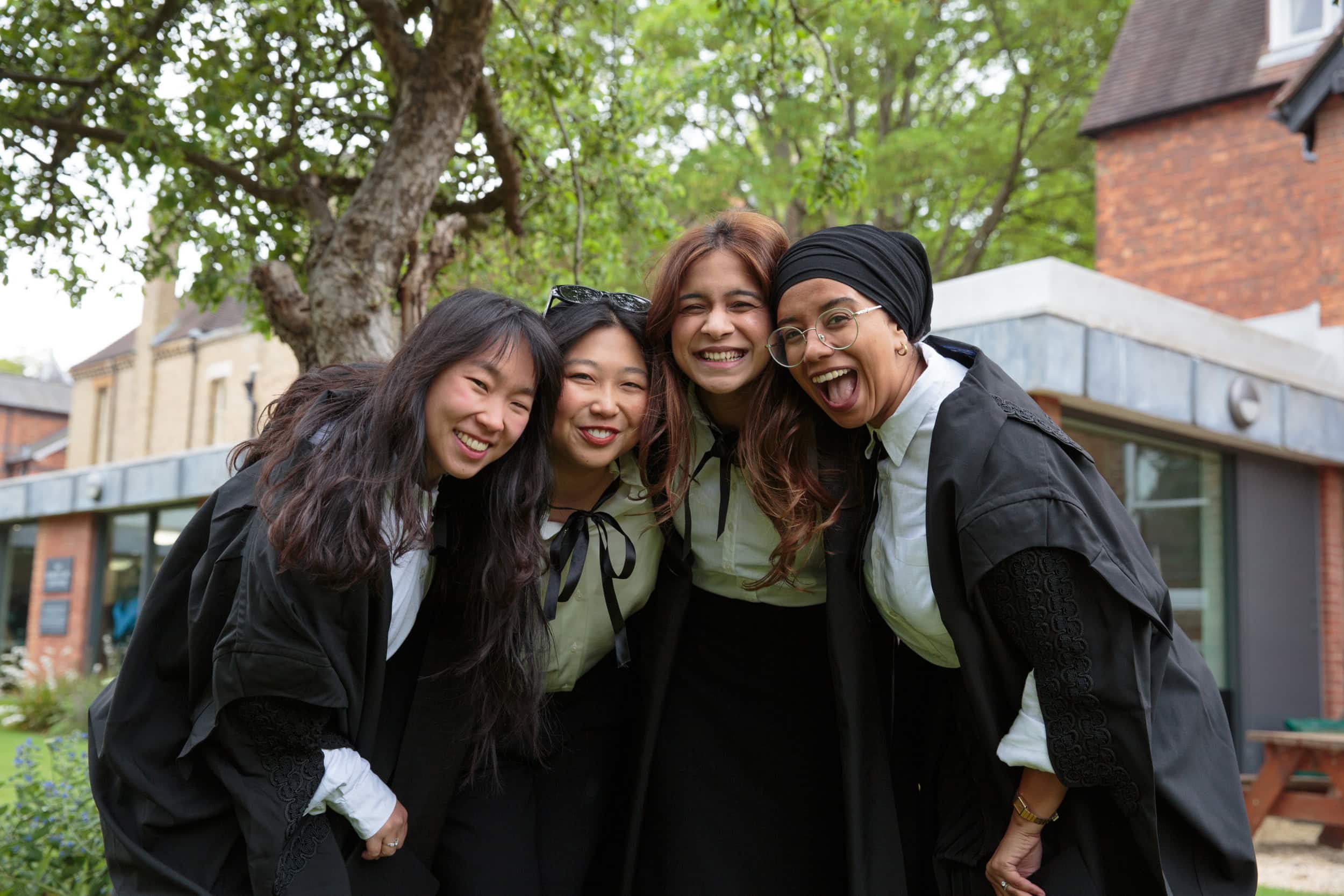 Group of female student smiling.