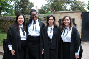 Four female students smiling