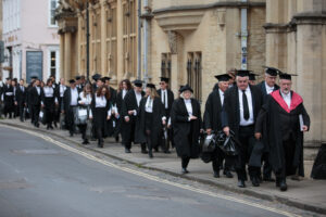 Students walking along the path of Broad Street