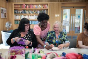 Guests taking part in a craft activity inside the Hub.