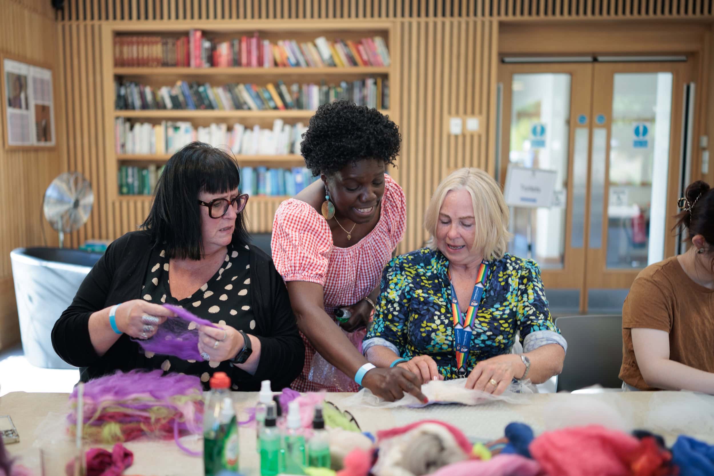 Guests taking part in a craft activity inside the Hub.